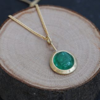 Beautiful emerald cabochon lollipop pendant necklace, set in 18k gold on a gold chain. Designed and handmade in Cornwall, UK by William White