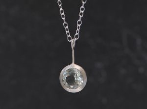 Green amethyst lollipop pendant, set in satin finished sterling silver on a silver chain. Choice of chain length. Designed and handmade by William White