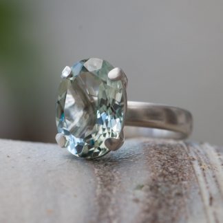 pale green amethyst solitaire claw set in sterling silver ring