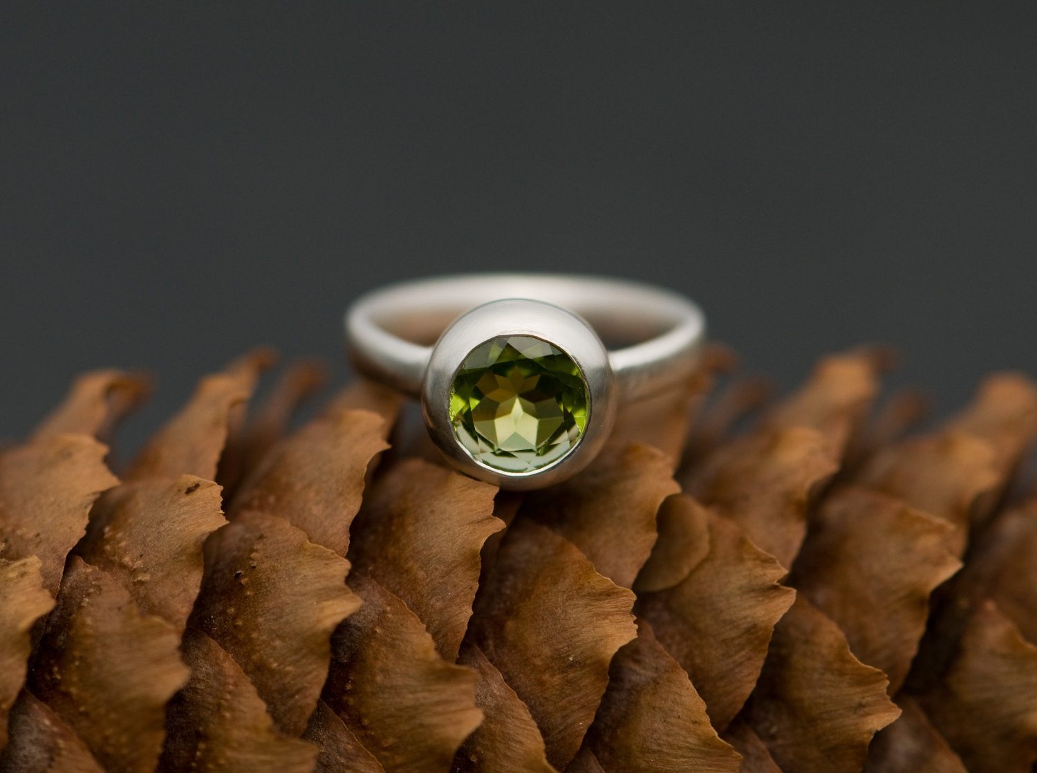 Green peridot solitaire ring in silver