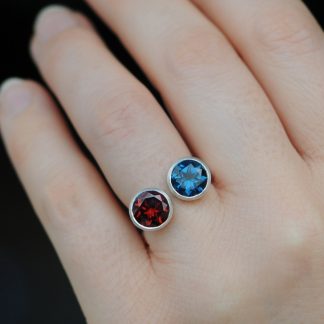 Red garnet and blue topaz owl ring in silver
