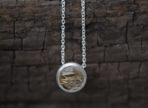 Simple Rutilated Quartz pendant necklace, in sterling silver on a silver chain. Choice of chain lengths. Designed & handmade by William White in Cornwall.