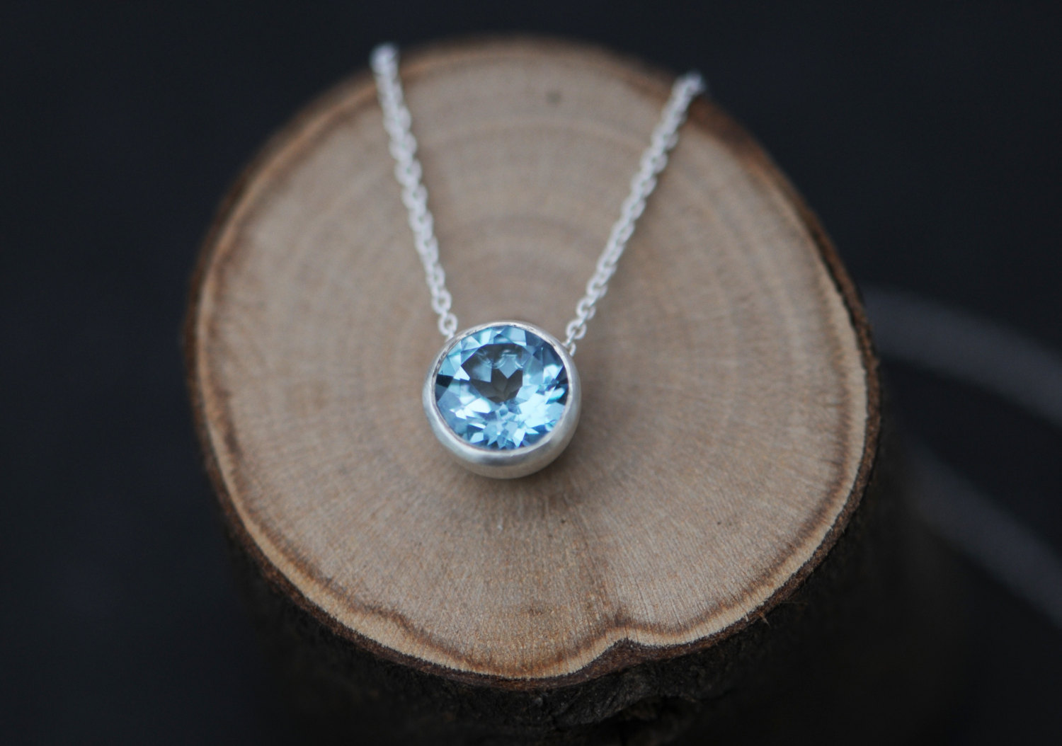 Lovely sky blue topaz, set in satin finished sterling silver pendant on a silver chain. Designed and handmade in Cornwall, UK by William White