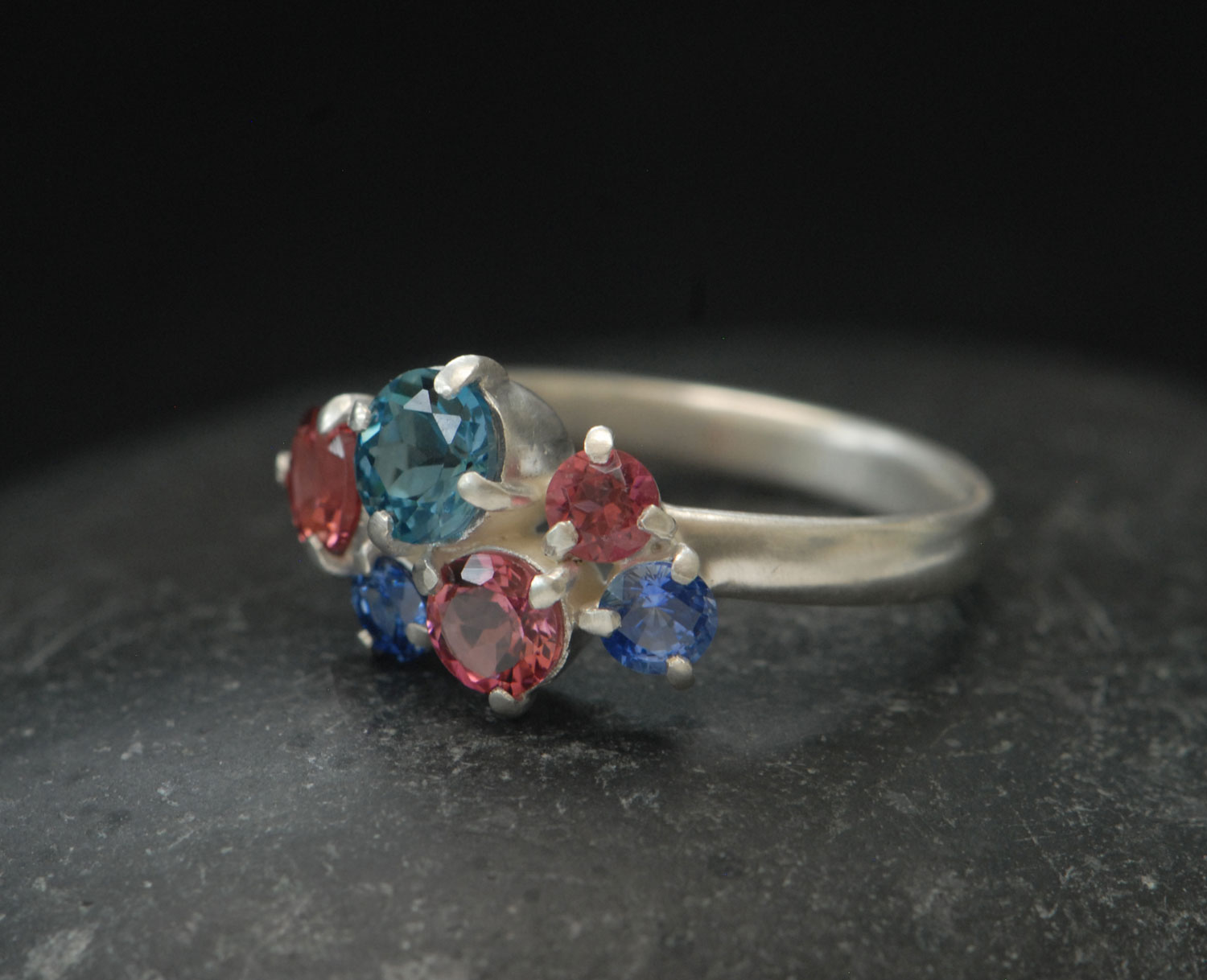 Topaz,-tourmailne-and-sapphire-cluster-ring-in-silver-side