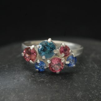 Topaz,-tourmailne-and-sapphire-cluster-ring-in-silver-front