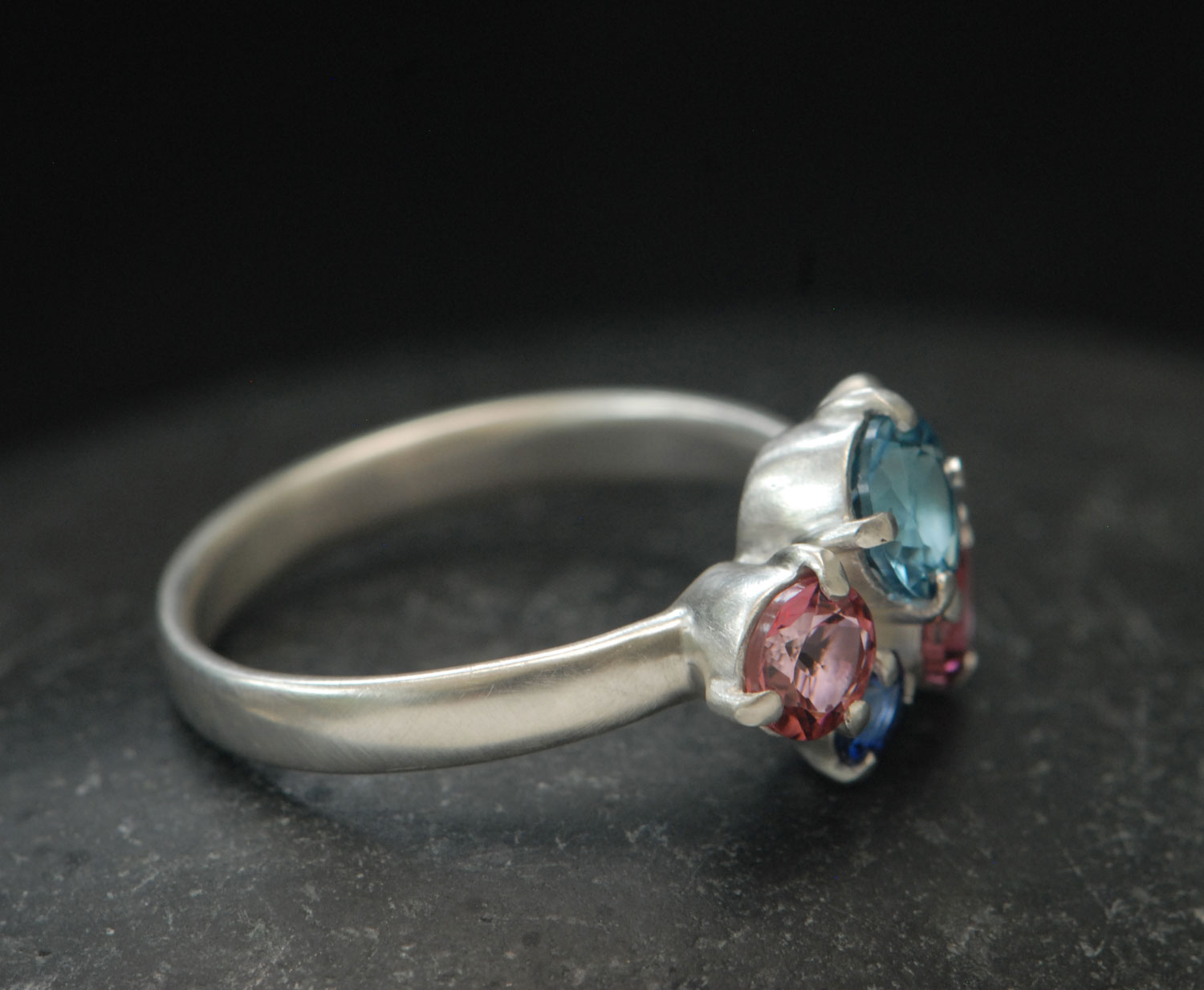 Topaz,-tourmailne-and-sapphire-cluster-ring-in-silver-side-3