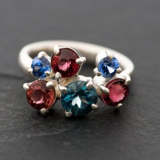 Cluster ring in silver with blue topaz, pink tourmaline and sapphire
