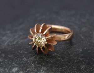 Champagne diamond set into rose gold sea urchin design ring