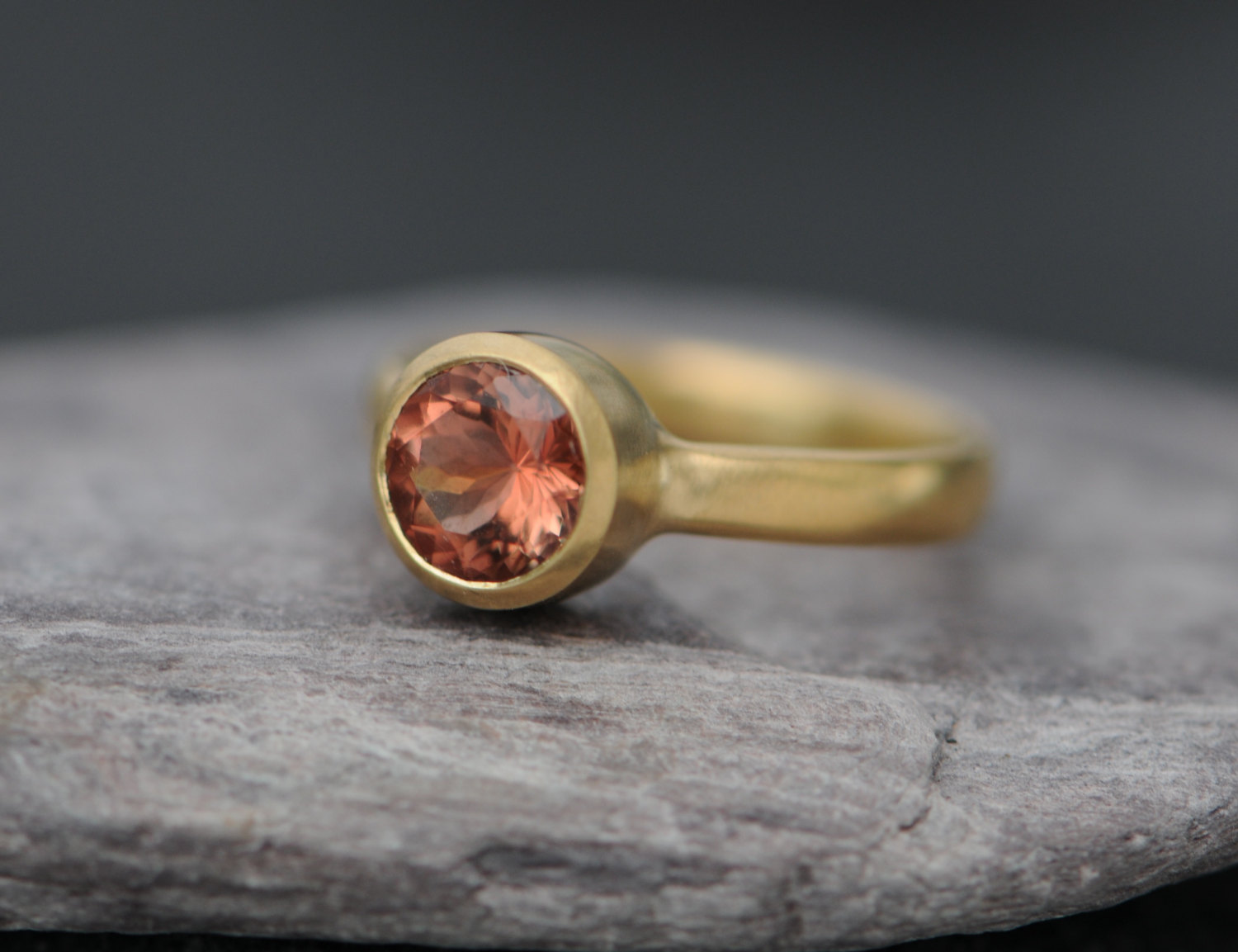 oregon sunstone solitaire set in simple gold ring design