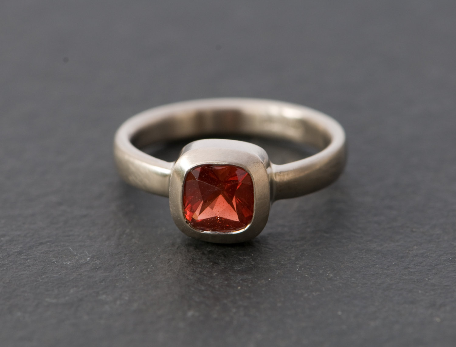 Square red Oregon sunstone in white gold ring