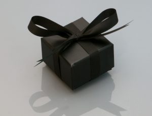 black box tied up with black ribbon