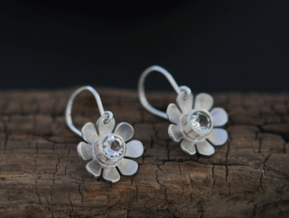 white-topaz-daisy-drop-earrings-in-silver