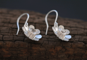 white-topaz-daisy-drop-earrings-in-silver