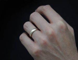 mans 5mm wedding band in 18K yellow gold