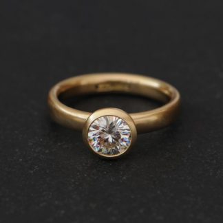 1.25ct moissanite halo ring in 18K y gold