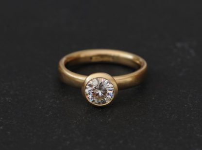 1.25ct moissanite halo ring in 18K y gold