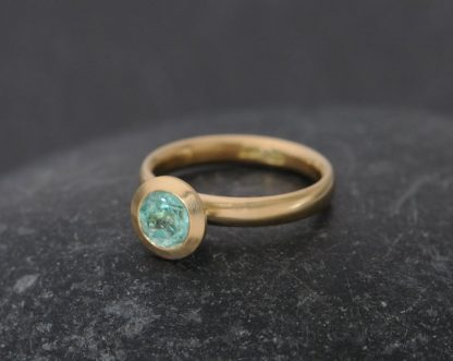 emerald 6mm halo ring in 18K yellow gold