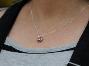 sea urchin necklace on neck