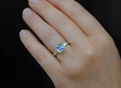7mm-asscher-cut-lab-pale-sapphire-mixed-metal-halo-ring