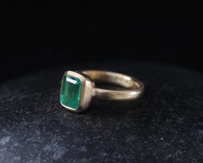 Emerald cut emerald ring in 18K yellow gold