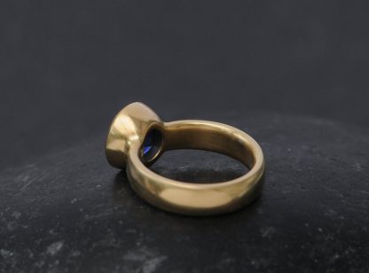 lab created 9mm blue sapphire in 18K yellow gold