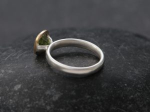 peridot 7mm cushion halo ring in 18K gold and silver band