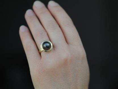 black pearl halo ring 18K yellow gold
