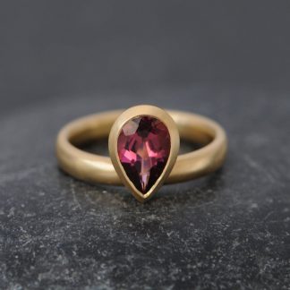 pink tourmaline pear cut ring in 18K y gold