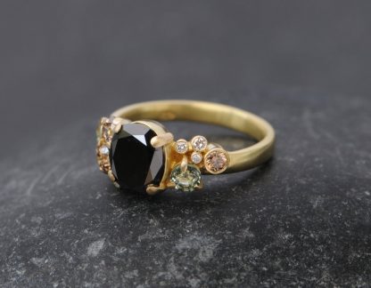 black diamond oval cluster ring with sapphires and diamonds 18K YG