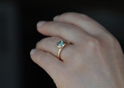 green sapphire 6.5mm halo set in 18K rose gold