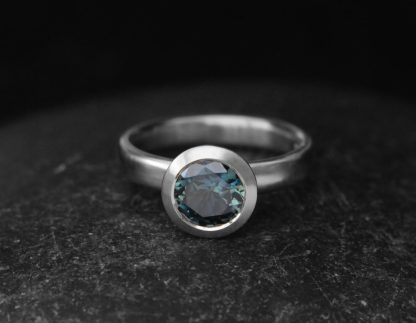 teal 7mm sapphire halo ring 18K white gold