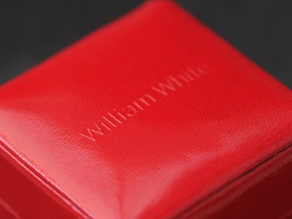 red leather ring box with bow