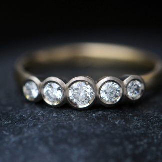 5 diamond ring in 18K white and yellow gold