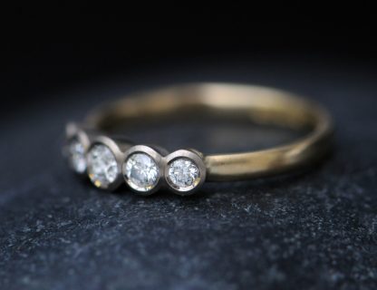 5 diamond ring in 18K white and yellow gold