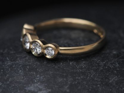 5-stone-diamond-ring-in-18K-yellow-gold
