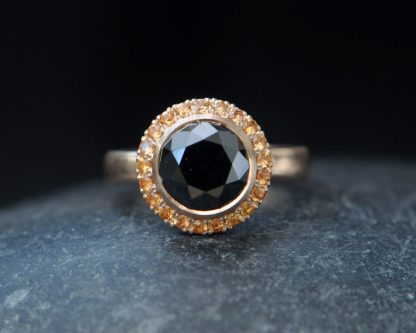 black-diamond-9mm-and-sapphire-halo-ring-18K-rose-gold