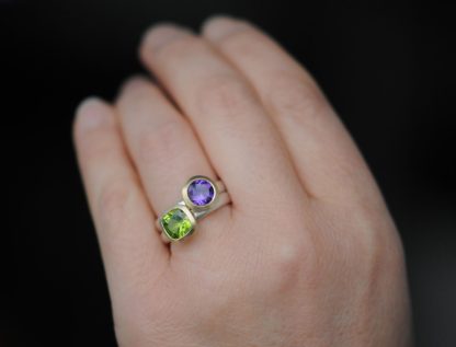 purple-ameyth-and-peridot-stacking-rings-in-9k-yellow-gold-and-silver-on-hand