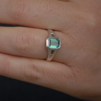 green tourmaline octagon cut split shank ring in silver on hand 2