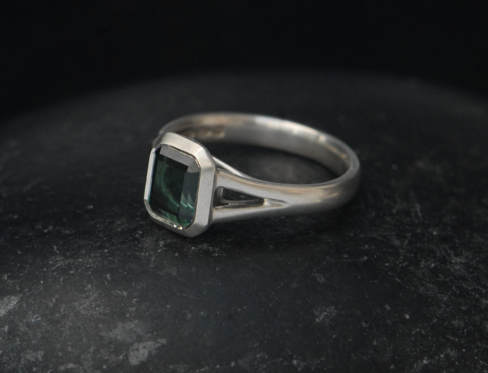 green tourmaline octagon cut split shank ring in silver side