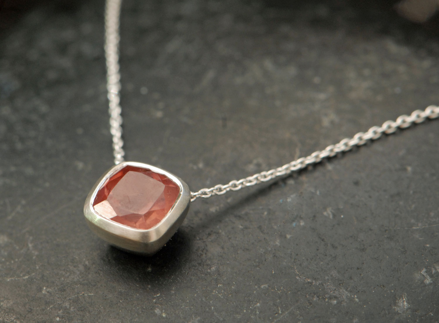sunstone-8mm-cushion-cut-silver-necklace.-side