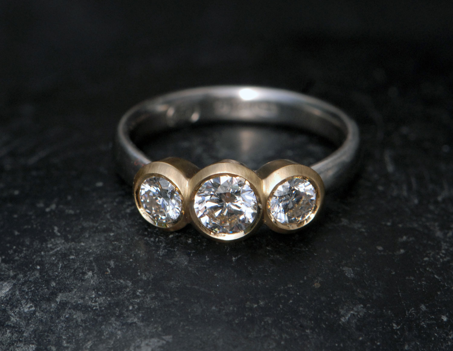 Lab-diamond-3-stone-mixed-metal-ring-18K-and-silver-side-on