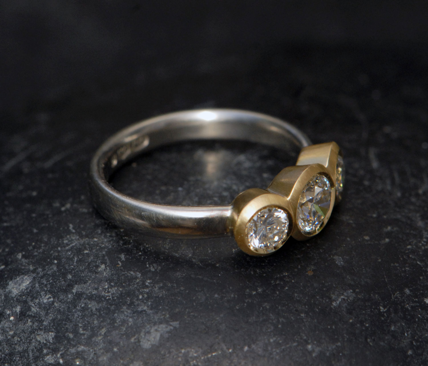 Lab-diamond-3-stone-mixed-metal-ring-18K-and-silver-side-on