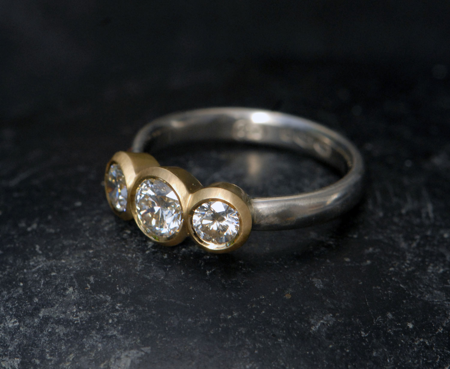 Lab-diamond-3-stone-mixed-metal-ring-18K-and-silver-side
