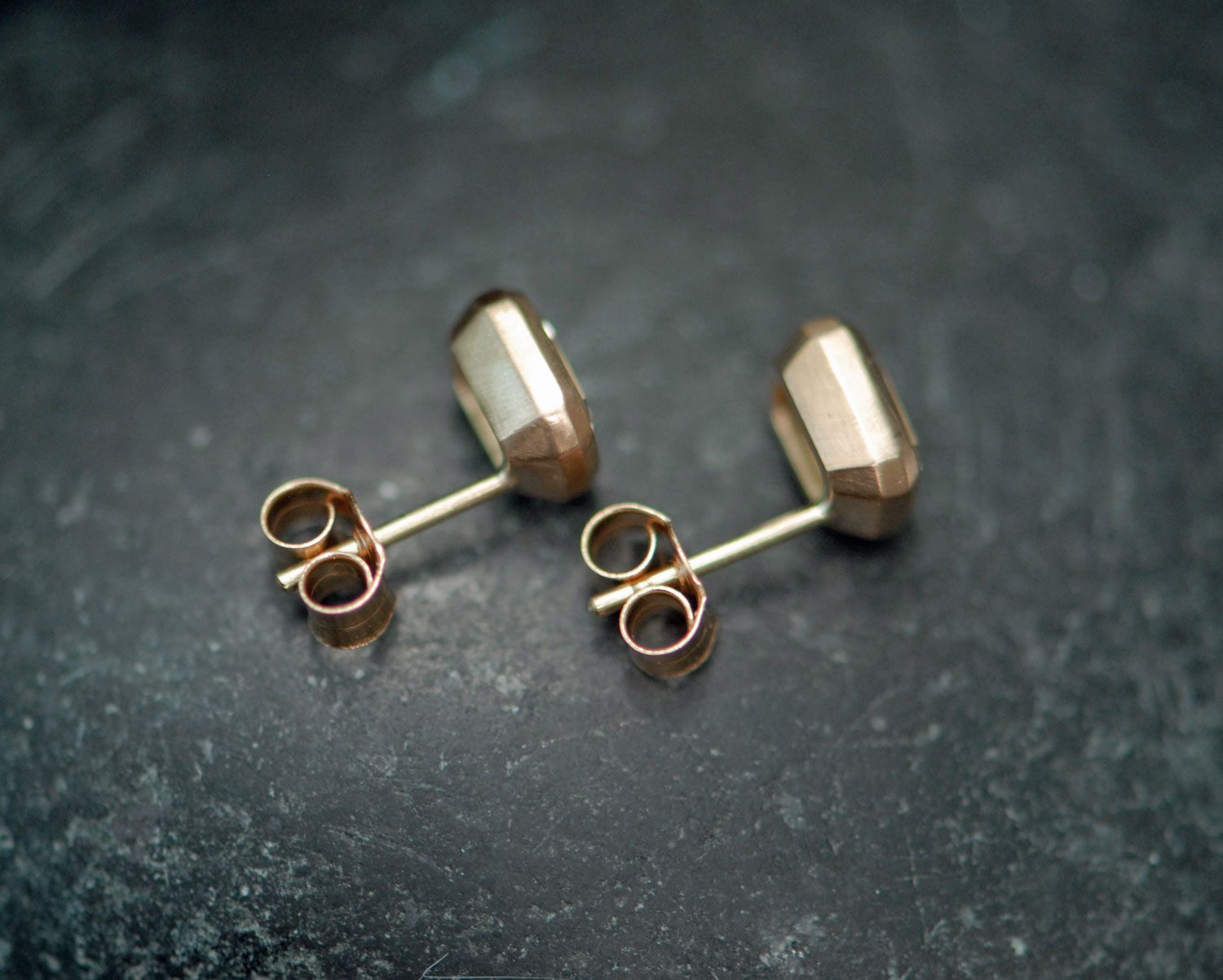 lab-diamond-octagon-cut-stud-earrings-in-18K-yellow-gold-side-on